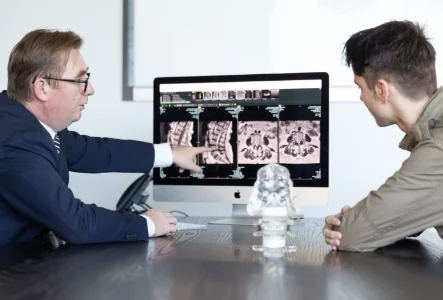 What type of surgery is used to treat Lumbar Disc Protrusions